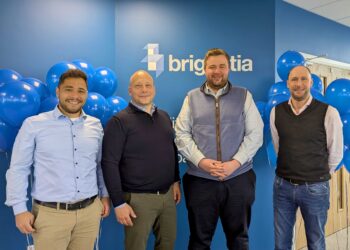 Angus Shaw (second from right) with Elovade board